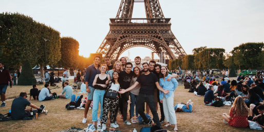 People in front of the Eiffel Tower.